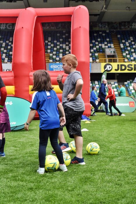 kids playing football